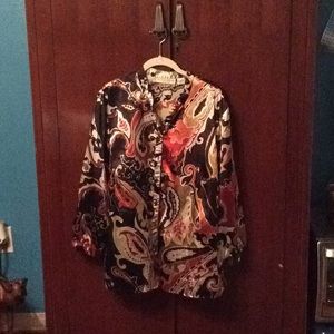 Long sleeve button up blouse.